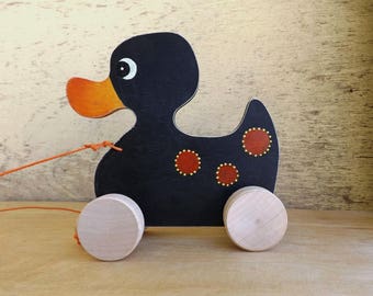Wood pull toy Duck in Black, handmade custom wooden toy for toddlers, personalized push animal toy on wheels