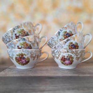 Juego de 6 tazas de té francesas de Limoges, porcelana con escena de cortejo de Fragonard, Lucien Engel Estrasburgo, tazas de té románticas doradas.