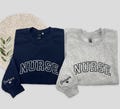 Custom Embroidered Nurse Sweatshirt With Name on Sleeve, Personalized RN Pocket Hoodie, Nurse Appreciation Week, Nurse Life Pullover