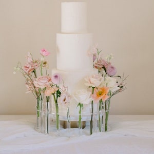 The Floral Crown - Flower stand - Floral arrangements - Fresh flowers - Floral wedding cake -