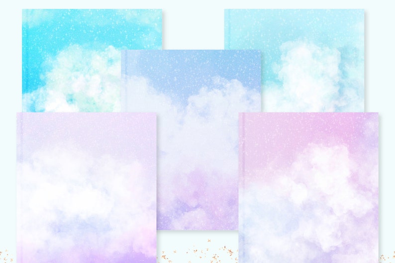 May include: A collection of five notebooks with watercolor cloud designs in shades of blue, purple, and pink. Each notebook features a different cloudscape, with a soft, dreamy aesthetic. The covers have a subtle, glittery effect.