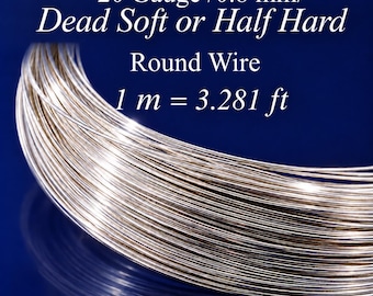 May include: A coil of silver-coloured round wire with text that reads 20 Gauge /0.8 mm/ Dead Soft or Half Hard Round Wire 1 m = 3.281 ft. The metallic wire is wound in a circular shape and features a reflective, polished surface texture.