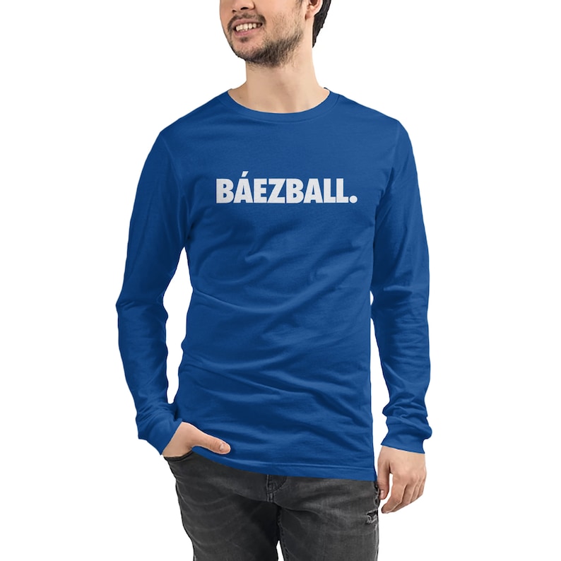 May include: A royal blue long-sleeve t-shirt with the text "B&Aacute;EZBALL." printed in white on the front.
