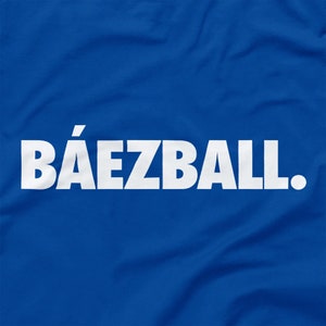 May include: A royal blue t-shirt with the white text "B&Aacute;EZBALL."