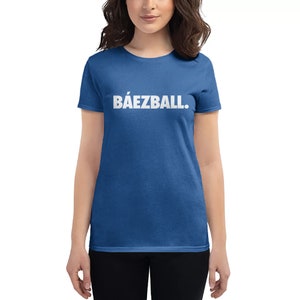 May include: A royal blue women's t-shirt with the text "B&Aacute;EZBALL." printed in white.