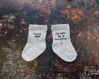 Chaussettes bébé, superbe annonce de grossesse garantie !