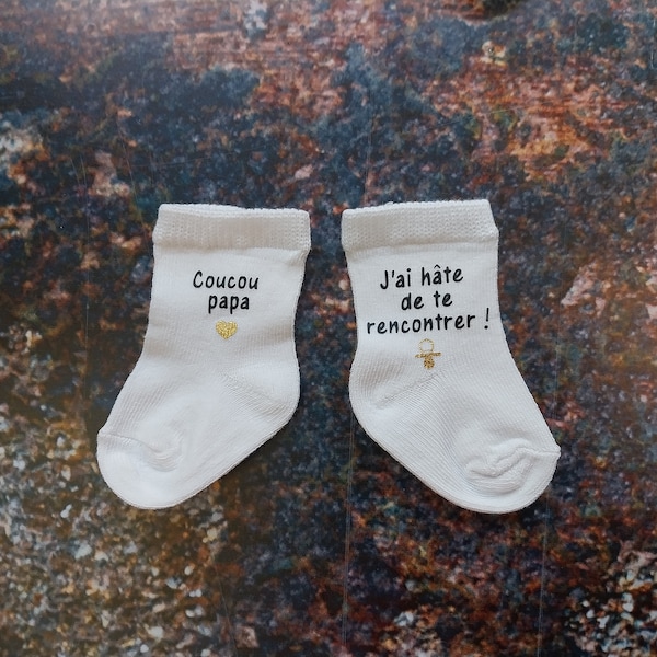 Chaussettes bébé, superbe annonce de grossesse garantie !