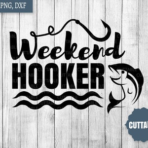 May include: Black and white graphic design with the text "Weekend Hooker" and a fish with a hook in its mouth. The design is on a woodgrain background.