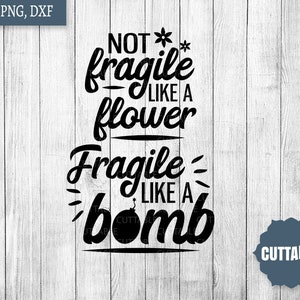 May include: Black and white graphic text design on a wood background. The text reads "Not fragile like a flower, Fragile like a bomb".