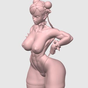 May include: A light pink 3D-printed figurine of a female character in a fighting pose. The figure wears a revealing outfit with star-shaped accents, spiked wristbands, and a choker. Her hair is styled in a traditional updo.