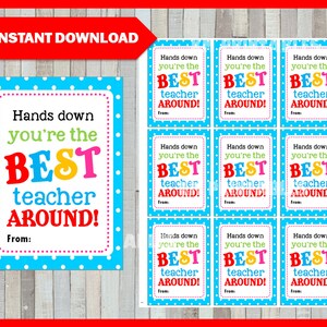 May include: Nine printable gift tags with a blue polka dot background. The tags say "Hands down you're the BEST teacher AROUND!" in colorful letters. The text "From:" is at the bottom of each tag.
