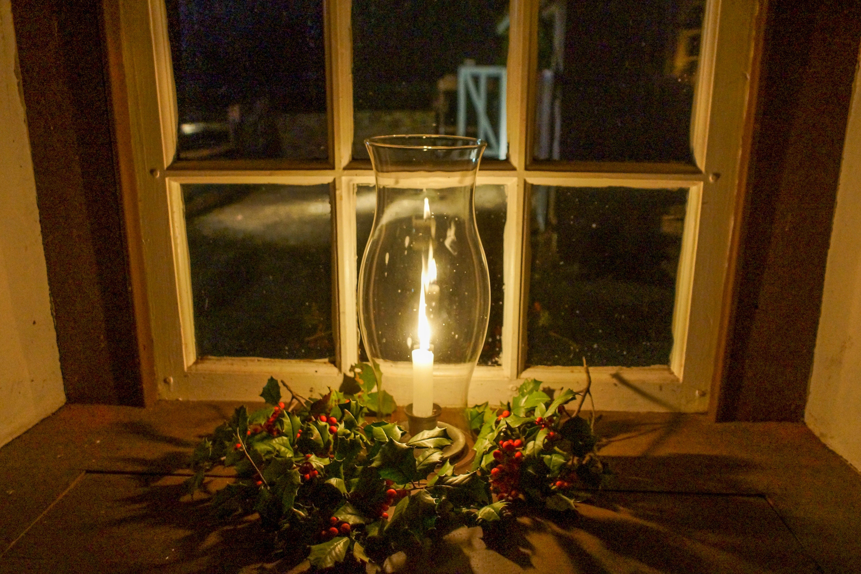 Solo Christmas Candle in a Window