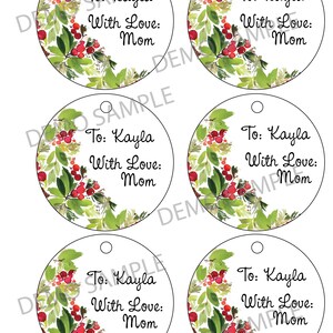 May include: Six round gift tags with a watercolor design of green leaves and red berries. The tags have a hole at the top for string or ribbon. Each tag has the text "To: Kayla" and "With Love: Mom" printed on it.