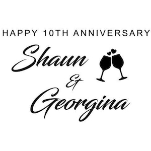 May include: A white background with black text that reads "HAPPY 10TH ANNIVERSARY" above the names "Shaun & Georgina". Two wine glasses clink together with hearts above them.
