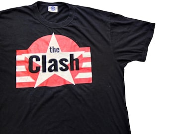 Vintage 90's The Clash Star And Stripes Band Logo T Shirt size XL (W 23 x L 30.5)