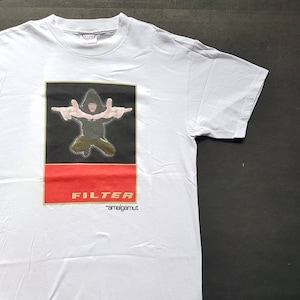 May include: White t-shirt with a black and red graphic of a man in a black hooded sweatshirt with his arms outstretched. The graphic says "FILTER" and "amalgamut" in gold lettering.