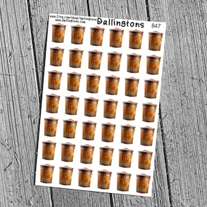 May include: A sheet of stickers with illustrations of small, rusty-looking bins. Each bin has a brown lid and an orange-brown, textured body. The stickers are arranged in a grid on a white background.
