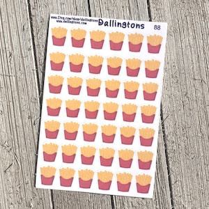 Puede incluir: Una hoja de 88 pegatinas con una ilustración de dibujos animados de un contenedor rojo y blanco de patatas fritas. Las pegatinas están sobre un fondo blanco. El texto "Dallingtons" está impreso en azul en la parte superior de la hoja.