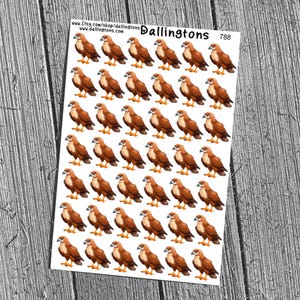 May include: Sheet of stickers featuring brown and tan hawk illustrations. Each sticker shows a hawk with detailed feathers and a focused gaze. The stickers are arranged on a white background, with the text "Dallingtons" and "788" visible.
