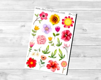 May include: A sheet of colorful flower stickers with a variety of pink, red, yellow, and purple flowers. The sheet also includes a sunflower and green leaves. The text "www.dallington.com M-15" is printed at the top of the sheet.