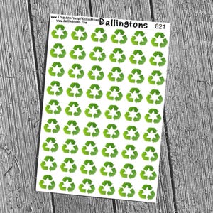 May include: A sheet of stickers with a repeating pattern of green recycling symbols. The stickers are on a white background, with the text "Dallingtons 821" at the top. The stickers are arranged on a wooden surface.