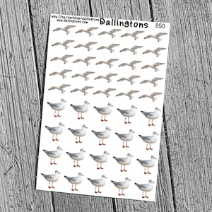 May include: Sheet of stickers featuring illustrations of seagulls in various poses. Some seagulls are in flight, while others are standing. The stickers are white with gray and brown details. The sheet has the text "Dallingtons" and the number "850".