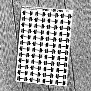May include: Sheet of stickers featuring black dumbbell illustrations. The stickers are arranged in a grid pattern on a white background. The sheet includes the text "Dallingtons" and "369". The background is a wooden surface.