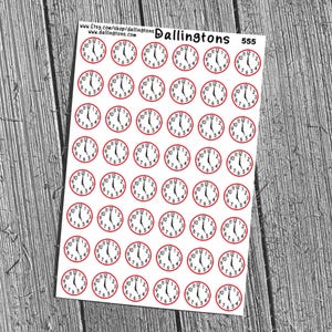 May include: Sheet of clock stickers with red borders and black hands, each showing a different time. The stickers are on a white background, with the text "Dallingtons" and "555" visible. The background is a wooden surface.