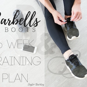 May include: A woman ties her black and green running shoes while sitting on a wooden floor. The text "Barbells & Boots 6 Week Training Plan" is visible in the image.