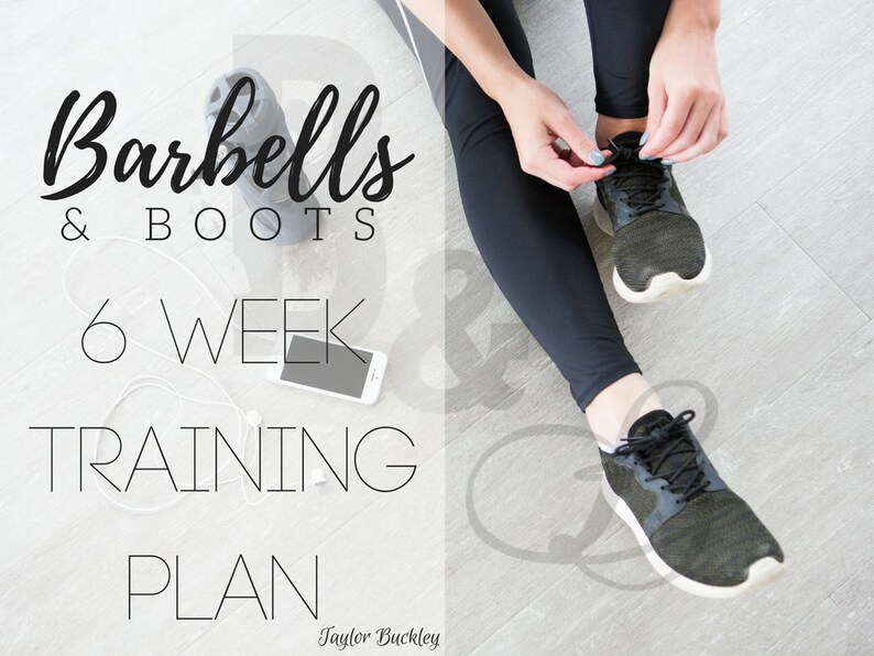May include: A woman ties her black and green running shoes while sitting on a wooden floor. The text "Barbells & Boots 6 Week Training Plan" is visible in the image.