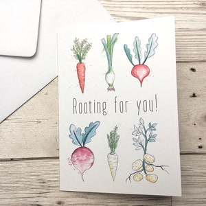Tarjeta de felicitación con la frase "Te apoyo". Tarjeta de buena suerte. Tarjeta con los mejores deseos. Tarjeta de felicitación con ilustraciones de verduras. Tarjeta con un divertido juego de palabras.