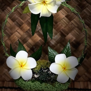 Glass mossy stand with Plumeria Floral hoop with tropical accents great table accessory to spread your Aloha Style