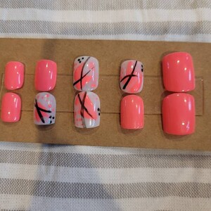 Pink nails with abstract art accents