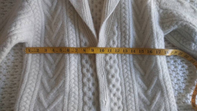In very good condition. Vintage heavy wool cable knit sweater