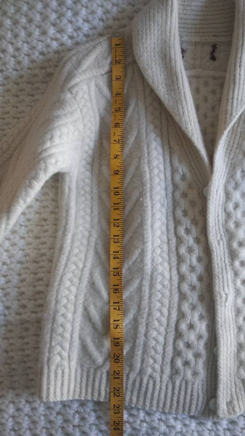 In very good condition. Vintage heavy wool cable knit sweater