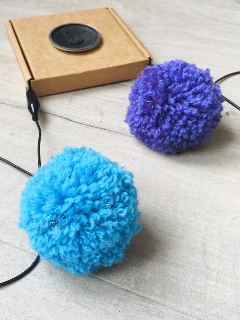 played by squeezing pompoms! DIY Pompom Musical Instrument Kit craft with e-textiles to make an electronic musical instrument