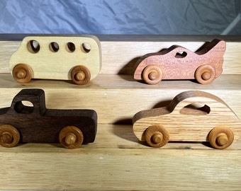 Four Small Wooden Vehicles