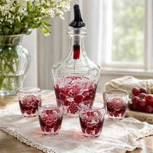 May include: A set of three ceramic mugs with a speckled, matte finish. The mugs are in shades of cream, light gray, and dark gray. Each mug has a simple, minimalist design, perfect for coffee or tea.