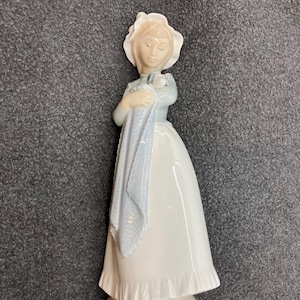 Discontinued NAO by Lladro Figurine Girl with blanketed Puppy
