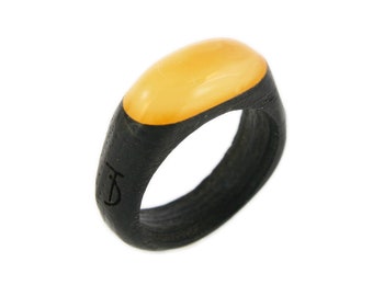 Oval ring with amber and wood, ring with amber and black oak wood
