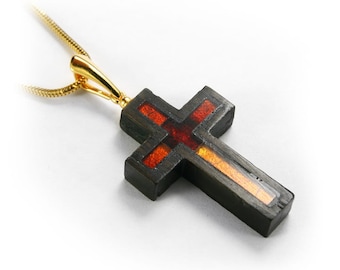 Amber cross pendant made of gilded silver and wood black oak, bursztynowy krzyż ze złoconego srebra i czarnego dębu