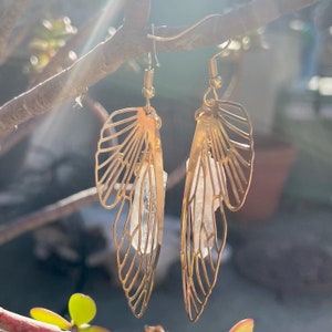 Clear quartz crystal wire wrapped dangly gold plated butterfly earrings Mariposa jewelry