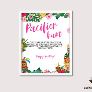 May include: A white sign with a pink and green tropical floral border. The sign says "Pacifier Hunt" in pink letters. The text below says "There are multiple pacifiers hidden throughout the shower. Whoever finds the most wins a special prize! Happy Hunting!"