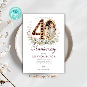 May include: A 40th anniversary invitation card featuring a large number 40 decorated with red gems, an oval photo frame with a couple, and watercolor eucalyptus leaves. The text includes names Amanda and Jack, date July 20, and location Golden Bloom Pavilion, Miami, FL.