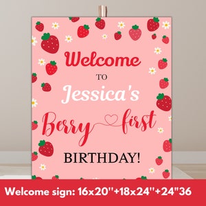 May include: Pink welcome sign with a strawberry theme. It says "Welcome to Jessica's Berry First Birthday!" with white daisies and red strawberries around the text.