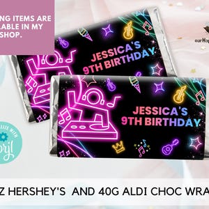 May include: Two chocolate bar wrappers with a neon design. The wrappers are black with pink, blue, and yellow neon accents. The text on the wrappers reads "Jessica's 9th Birthday".