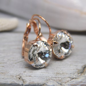 Hangoorbellen Swarovski-kristal: verguld messing, rivoli-slijpsel van 12 mm