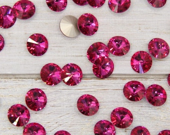 Fuchsia Rivoli Maxima Crystal: 12mm D-Foiled Round Stone