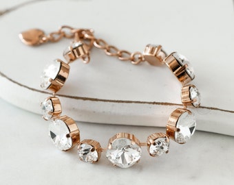 Armband i roséguld med klara kristaller: Justerbara brudsmycken