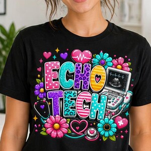 May include: A black short-sleeve t-shirt featuring a colorful graphic print with the text ECHO TECH. The design includes a medical ultrasound machine, a stethoscope, vibrant flowers, and hearts in various patterns like leopard print and polka dots.